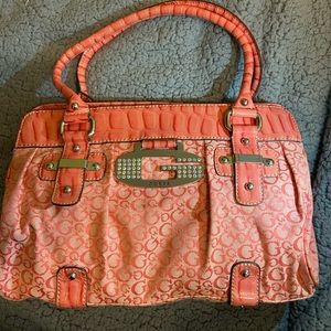 Coral colored Guess purse, medium size